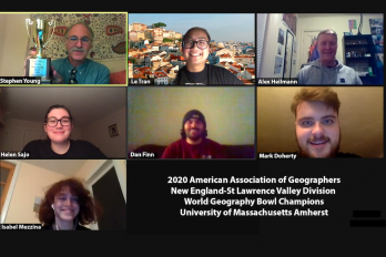 Zoom screenshot of UMass Geography Club members with text: "2020 American Association of Geographers New England-St Lawrence Valley Division World Geography Bowl Champions University of Massachusetts Amherst