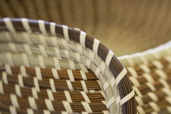 A closeup of a woven basket