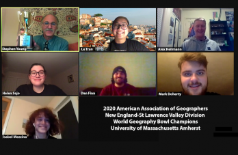 Zoom screenshot of UMass Geography Club members with text: "2020 American Association of Geographers New England-St Lawrence Valley Division World Geography Bowl Champions University of Massachusetts Amherst