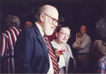 Scanned film photo of Dr. Jon Hubert with his late wife Mary-Alice at a party, looking to right outside frame, some time in the laye 1980's.
