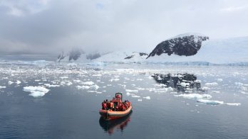A boat floats in Neko Harbour, Antarctica, in February 2018.  Alexandre Meneghini / Reuters