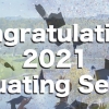 "Congratulations Graduating Seniors!" text over image of garduates throwing caps into the air superimposed over image of UMass Campus with Holyoke Range in background