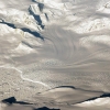 Glaciers and mountains in the evening sun are seen on an Operation IceBridge research flight, returning from West Antarctica. Credit: Sipa US / Alamy Stock Photo