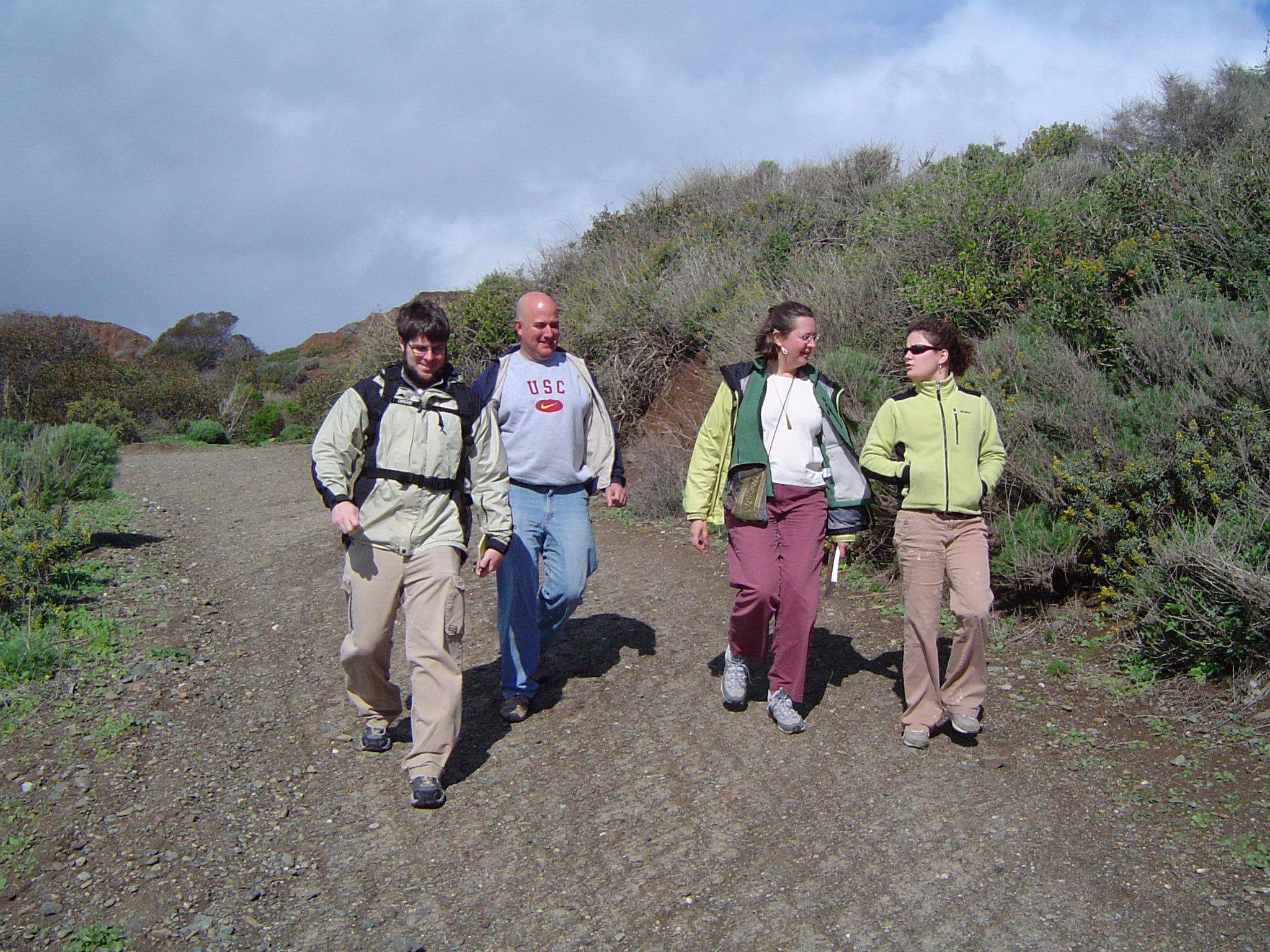 Scott, Chris, Michele and Laura walking down the path to get to the fault