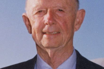 Portrait of Dr. Ward Motts in front of blue sky
