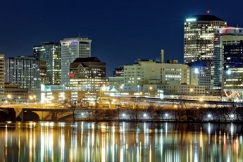 Skyline of Hartford, CT over the Connecticut River at Night.