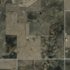 The agricultural landscape south of Clear Lake, Iowa. The light-colored patches in plowed fields are areas where dark-colored, organic-rich topsoil has been lost to erosion. Image courtesy GoogleEarth.